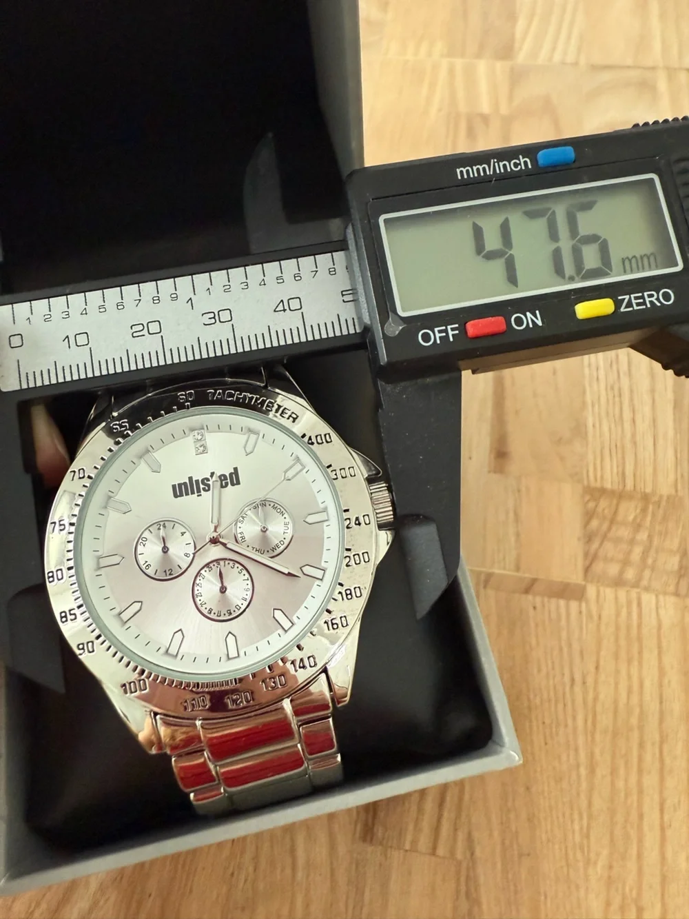 Unlisted by Kenneth Cole mend silver tone watch NEW BATTERY